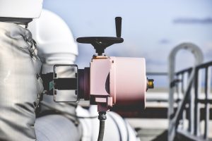Photo Technician repairing HVAC