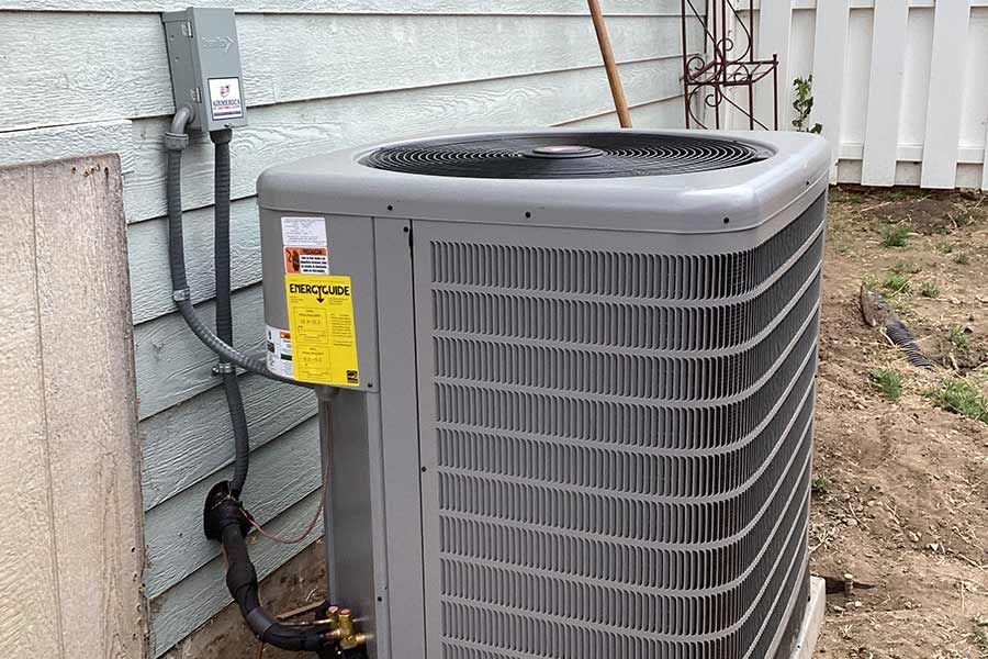 Outdoor central air conditioning unit installed