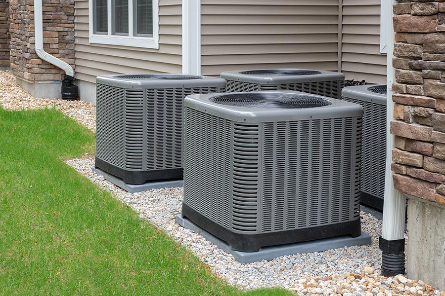 Four outdoor HVAC units installed
